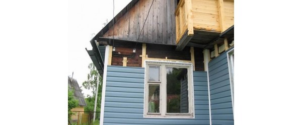 Чем обшить деревянный дом: